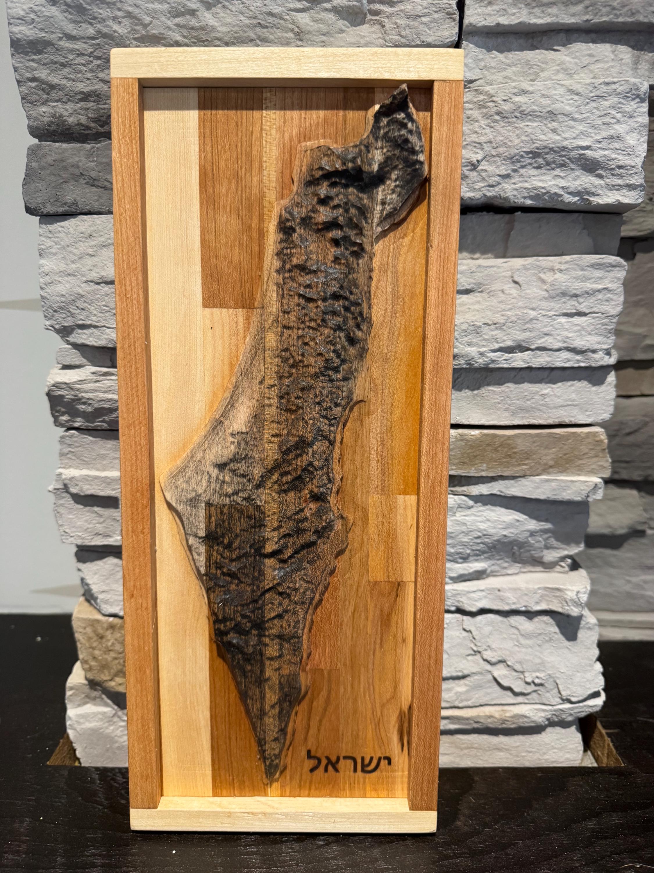 A full vertical shot of the 3D maple and oak map of Israel standing upright against a dark background, highlighting its proportions and rustic elegance. __etsy:8204354189