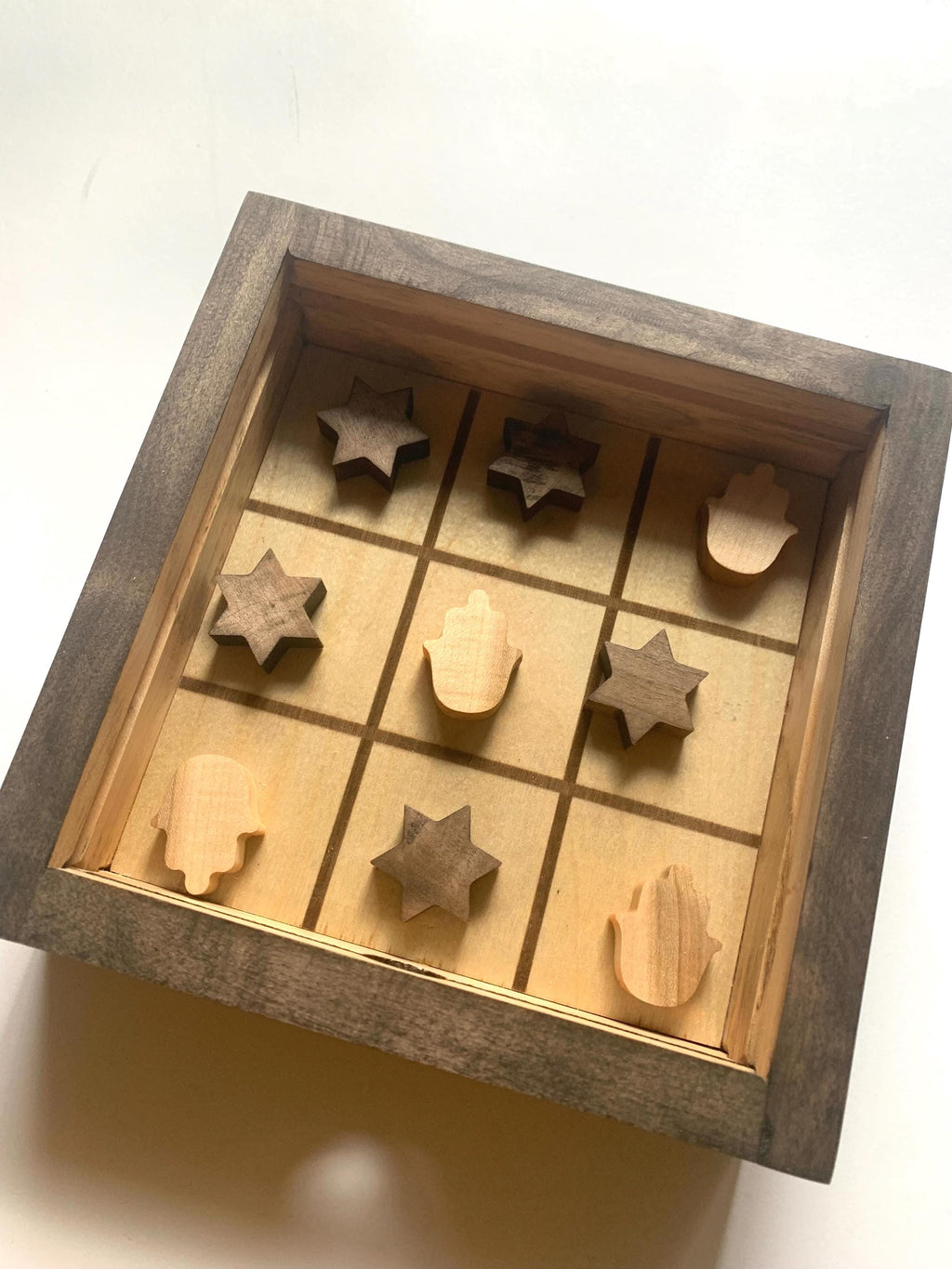 Game of Tic Tac Toe made out of wood, with acrylic cover and two toned pieces in the shape of hamsas and stars of david __etsy:6598336456