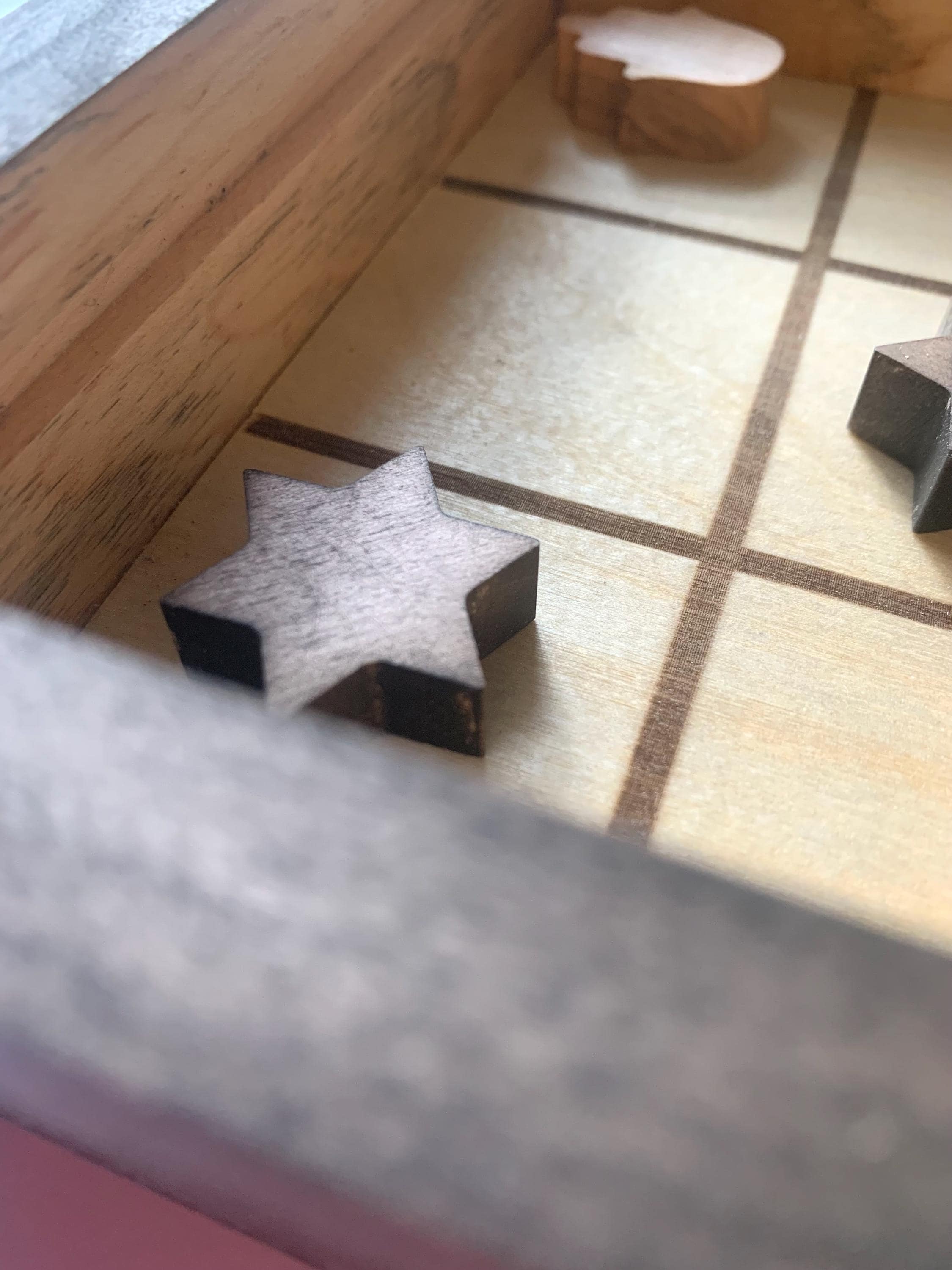 Game of Tic Tac Toe made out of wood, with acrylic cover and two toned pieces in the shape of hamsas and stars of david __etsy:6598335620