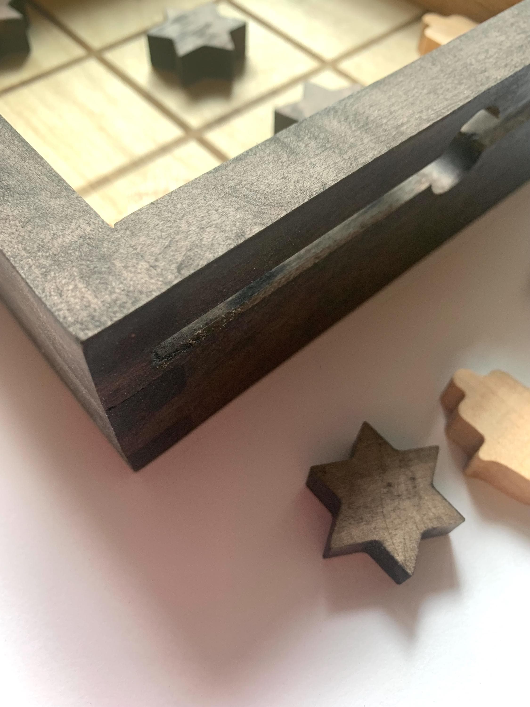 Game of Tic Tac Toe made out of wood, with acrylic cover and two toned pieces in the shape of hamsas and stars of David __etsy:6646450013